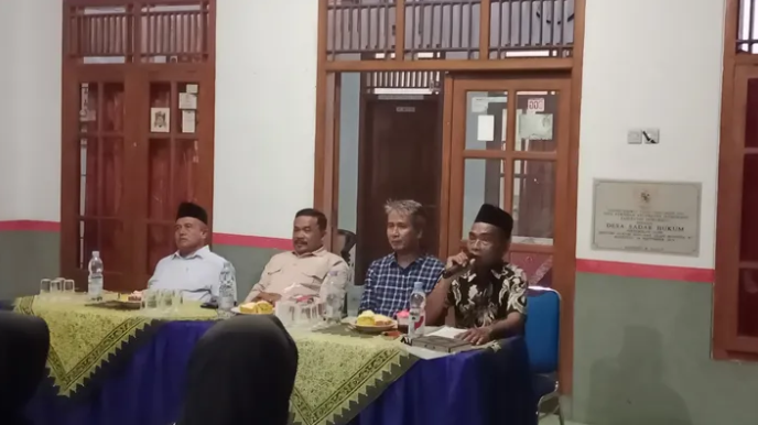 Pengukuhan Panitia Pilwu Desa Pawidean, Camat Tekankan Netralitas